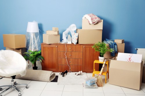 Loading furniture and boxes into a moving truck in Grove Park