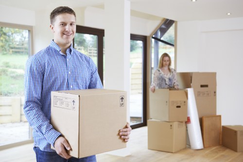 House movers loading furniture for a home move in Grove Park
