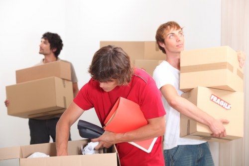 Residential moving support in Grove Park with boxes and wrapped furniture