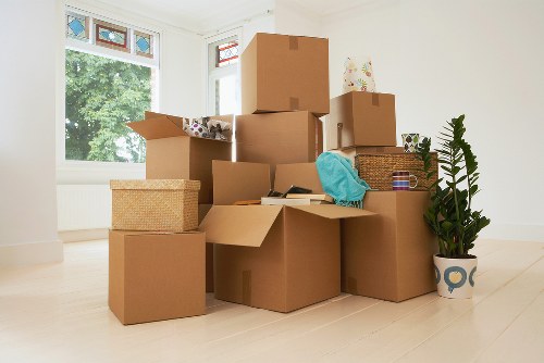 Professional movers handling furniture carefully on moving day