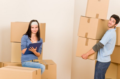 Packing materials and moving equipment arranged neatly for a safe move